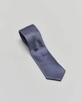 Blue navy tie with small circles pattern made of pure silk.