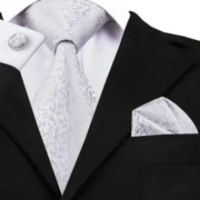 Silver floral tie sets with pocket squares and cufflinks.