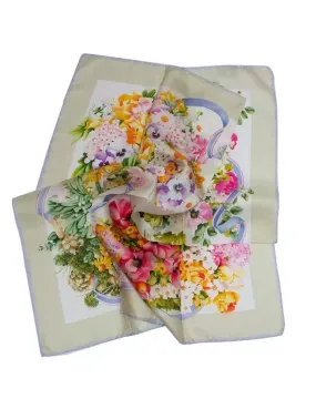 Silk twill scarf with floral bouquet and beige border.